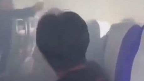 Power bank explosion sparks panic on plane as flight forced to turn back after just 15 minutes