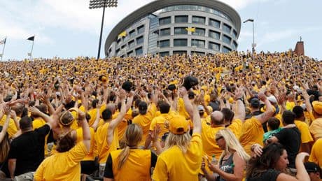 College football traditions: 'Hawkeye Wave' bonds everyone in stadium with kids in adjacent hospital