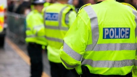 Eight people arrested in two separate terrorism cases after police raids across the UK