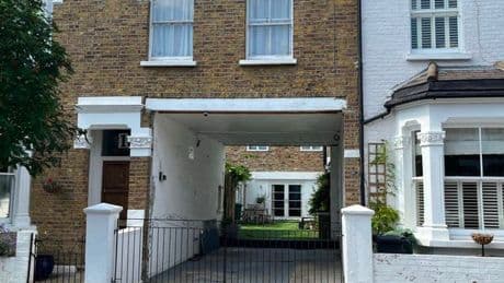 Parliament bell ringer rips out neighbour's gate but insists he's in the right