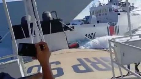 'Dangerous manoeuvres' condemned as vessels collide in disputed waters