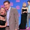 Pamela Anderson cuddles up to co-star Liam Neeson as they continue their cosy red carpet displays at The Naked Gun premiere in Berlin after sparking romance speculation