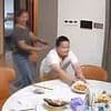 Incredible moment hungry boy races back to finish his meal in the middle of an earthquake