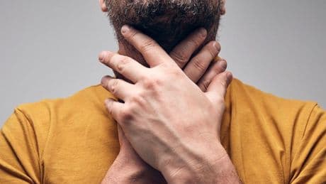 'Swallowing razor blades': What to know about the painful symptom linked to latest COVID strain