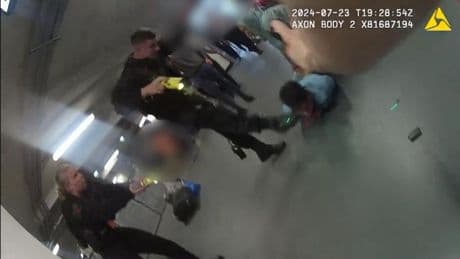 Body cam footage shows brothers ‘throwing punches’ at Manchester Airport police officers