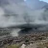 Moment devastating flood tears through village after massive glacial burst sends massive wall of debris hurtling down mountain