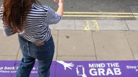 ‘Mind the grab’: Oxford Street shop paints phone theft warnings onto street