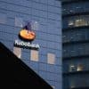 Rabobank boekt minder winst door lagere rentes, wel hoge spaartegoeden