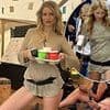 Lottie Moss channels sister Kate's iconic Glastonbury style as she slips into THAT gold dress and wellies - 21 years after the supermodel stunned in the leggy look