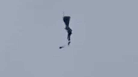Horror moment soldier's parachute FAILS in Thailand as he plummets to the ground