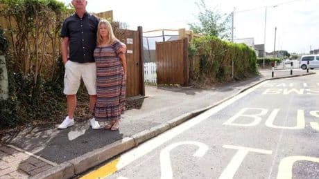 Couple fume as school bus stop installed at end of their drive