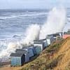 Local council removes £1million cliffside beach huts at risk of falling into the sea