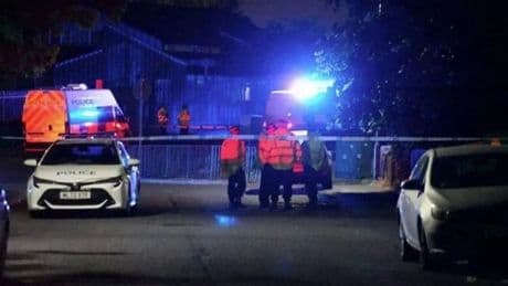Man arrested on suspicion of murder after man, 19, found lying in road