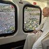 Pope makes rock-star entrance by helicopter for open-air prayer vigil with a million screaming pilgrims in Rome