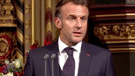 Britain and France must shoulder burden of keeping Europe safe, Macron says in historic parliament address