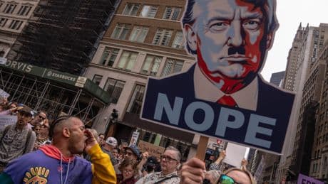 Thousands take to the streets across US to protest Trump and Musk policies: ‘They flaunt their criminality’