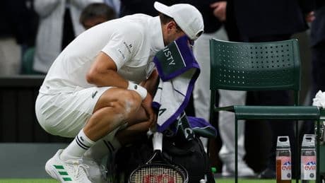 Wimbledon 2025: Grigor Dimitrov retires injured when two sets up as Jannik Sinner avoids shock defeat