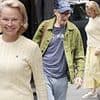 Pamela Anderson is all smiles as she leaves London's Corinthia Hotel with Liam Neeson after their true feelings about each other were 'revealed'