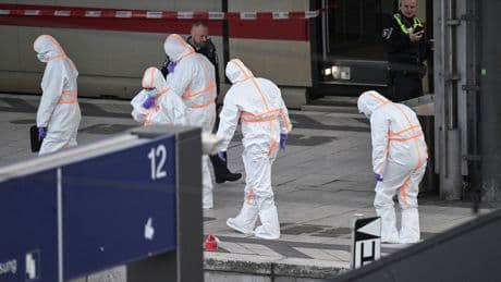 Train station stabbing in Germany leaves '12 people' injured - as woman arrested
