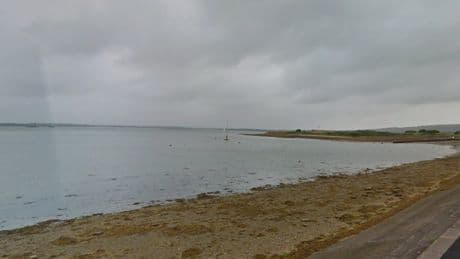 Man dies and another missing after inflatable boat crash near Portsmouth