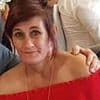 Horror as 'vibrant' mother-of-five, 50, is killed in hit-and-run outside pub - as police arrest two teenagers in connection