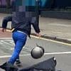 Instant karma! Moped rider ditches scooter in the middle of the road as he attempts to run away from police - but is swiftly detained by officers