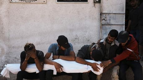 At least 16 Gazans killed in Israeli strikes as US-backed group pauses humanitarian aid