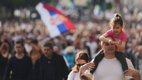 Thousands rally in Serbia's capital demanding snap elections after months of protests
