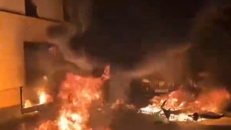 Fires and tear gas erupt around Paris as chaos reigns amid Champions League win