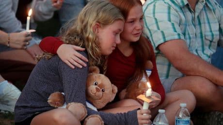 Minneapolis Catholic schoolchildren listened to a prayer, then ducked for cover from gunfire