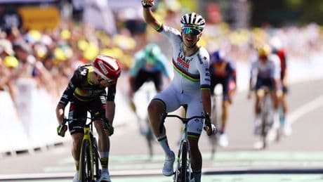 Tadej Pogacar outsprints Jonas Vingegaard to win stage seven and reclaim Tour de France lead
