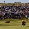 Buried ball baffles McIlroy in wild ride for hometown hero at British Open
