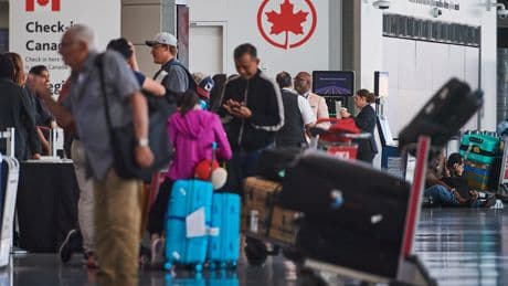 Toronto Pearson Airport warns of delays from Air Canada strike, passengers still stranded