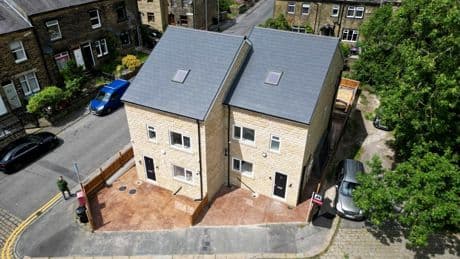 Our neighbour built TWO new builds next to our quaint cottages – we’ll buy popcorn & watch council rip them down