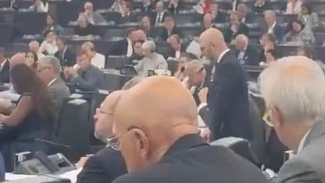 Shocking moment left-wing politicians refuse to take part in minute's silence for Charlie Kirk in European Parliament - prompting screaming match with right-wing opponents