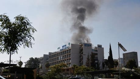 Israeli hospital hit by Iranian missile as Trump 'approves Iran attack plan' but yet to decide whether to strike