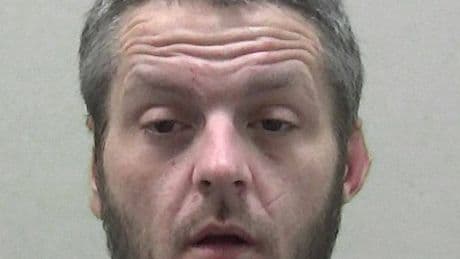 Blood-soaked crack addict grabs woman by the neck in lift at block of flats