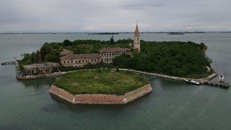 Inside world's 'creepiest' island with 160,000 corpses which tourists are banned from