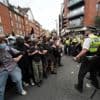 Rival anti-migrant and anti-racism protests face off outside a hotel housing migrants in London