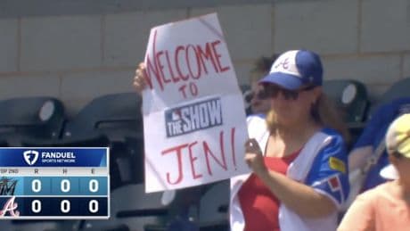 Fans give Jen Pawol plenty of support as she makes MLB history as first female umpire
