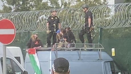 Terror arrests after van driven into defence factory's fence