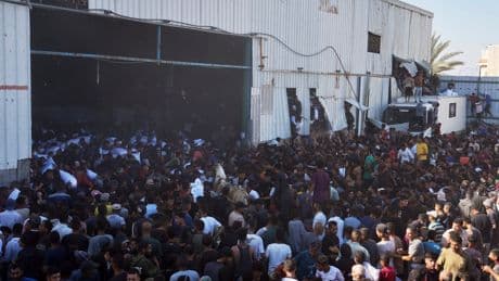 Four killed in Gaza as Palestinians storm UN warehouse in desperate search for food