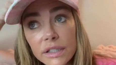 Denise Richards teary-eyed as she discusses 'difficult time' amid divorce