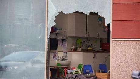 Toddler dead and nine injured after car crashes through daycare window