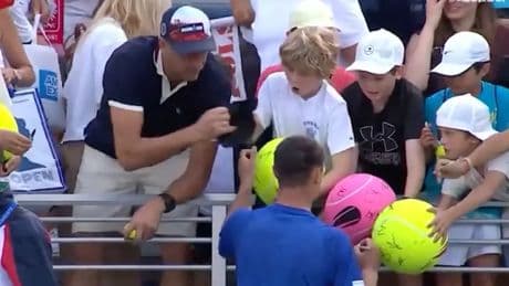 US Open hat snatcher identified as tennis star meets young boy