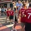 Fans hit out at 'classless and pathetic' Spurs 'bullies' who drenched Man United supporters in beer ahead of Europa League final