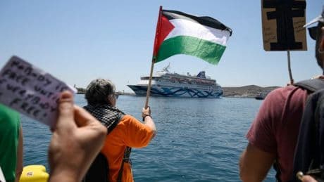 Pro-Palestine protesters block Israeli cruise ship from docking on Greek island