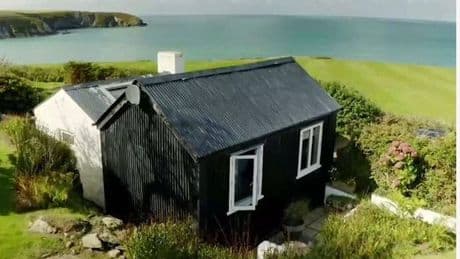 Inside 'one of the UK's most beautiful' beach huts in its most secret bay