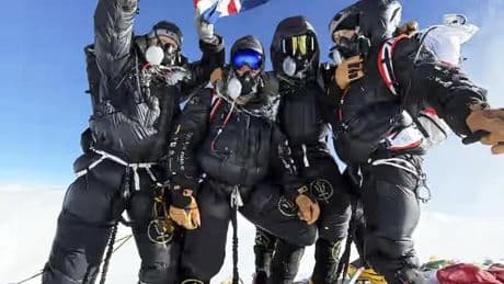 A renowned mountain guide puts clients on Everest summit less than a week after they left London
