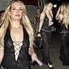 Lottie Moss goes braless in a semi-sheer black dress as she enjoys a girls' night out at Sheesh in London